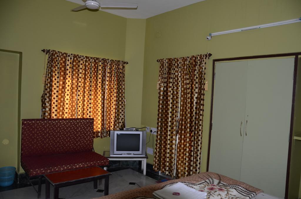 כלכותה Kim Lawn Guest House חדר תמונה